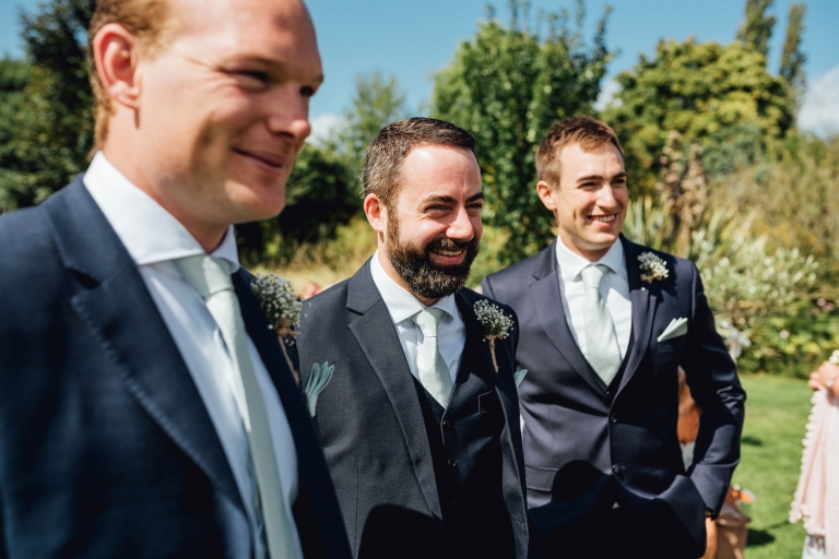 groomsmen laughing
