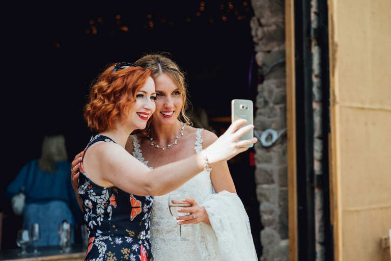 brides and guest beaming smile